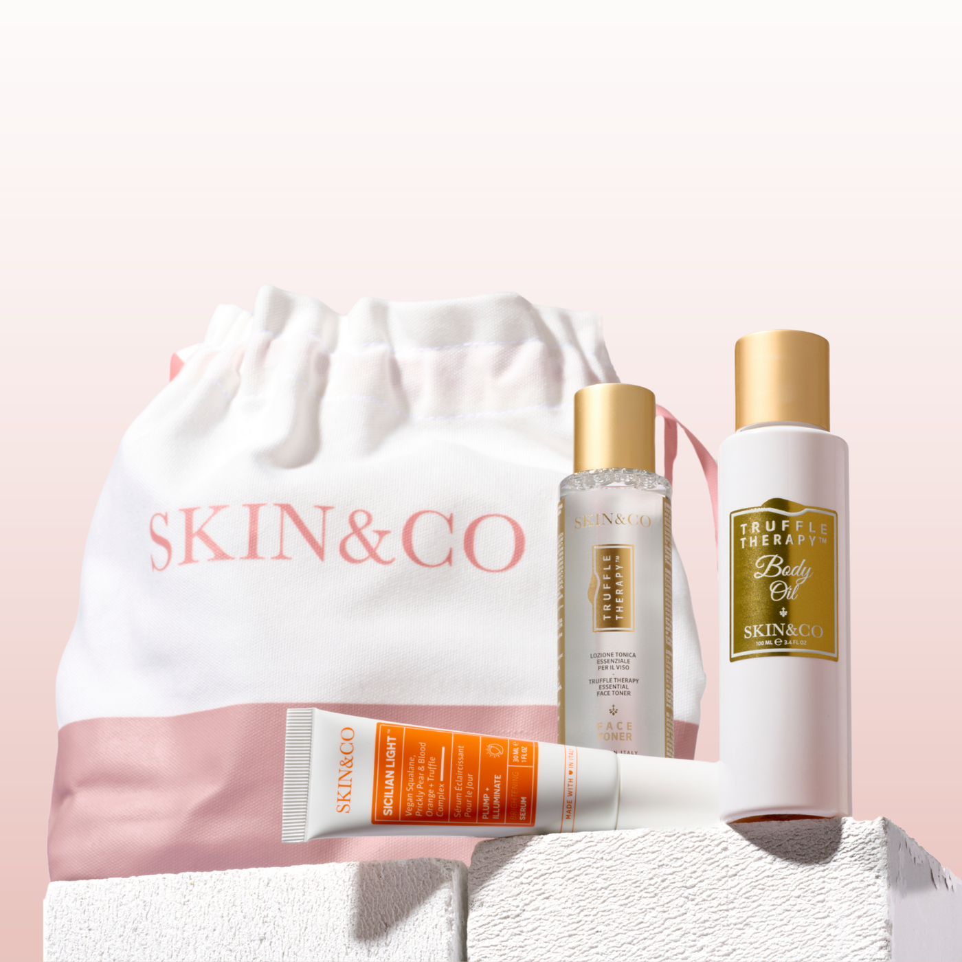 SKIN&CO Truffle Therapy Skincare Discovery Kit + Cosmetic Bag ($199 Value)