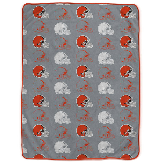 Browns blanket with red and white football helmet pattern on a white background